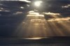 The-sunbeam-illusion-or-crepuscular-rays-The-sun-shines-through-clouds-creating-regions.jpg